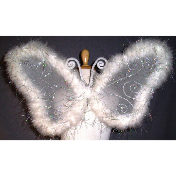 White Butterfly Wings Feather Surrounds Silver Glitter Swirls